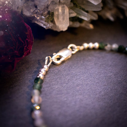 Beautifully handmade, moss agate crystal stacking bracelet. This bracelet has been made using high quality moss agate beads which are facetted to give a gorgeous sparkle. Strung on 49 strand beading wire for durability and a good drape on the wrist.