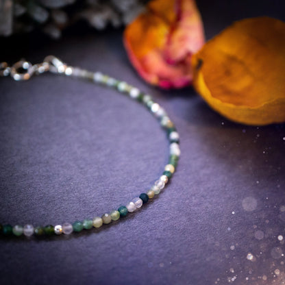 Beautifully handmade, moss agate crystal stacking bracelet. This bracelet has been made using high quality moss agate beads which are facetted to give a gorgeous sparkle. Strung on 49 strand beading wire for durability and a good drape on the wrist.