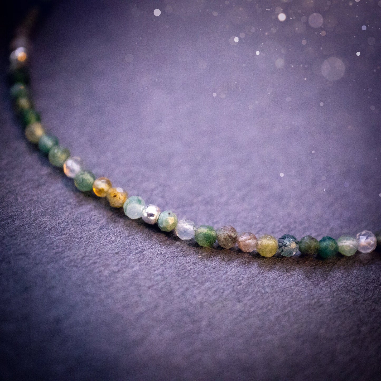 Beautifully handmade, moss agate crystal stacking bracelet. This bracelet has been made using high quality moss agate beads which are facetted to give a gorgeous sparkle. Strung on 49 strand beading wire for durability and a good drape on the wrist.