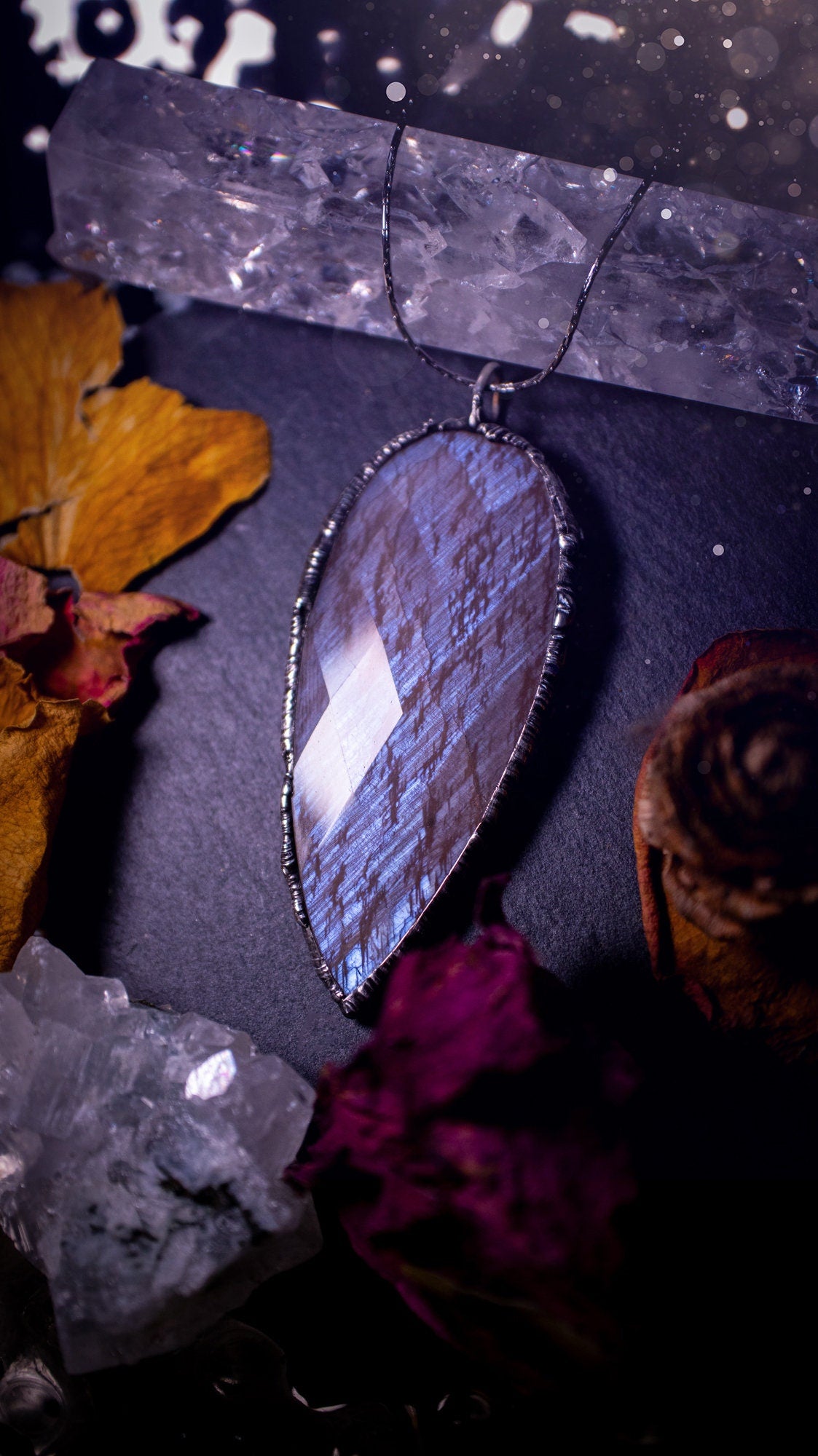 One of a kind, belomorite soft soldered pendant necklace. This pendant has been made using the tiffany technique and is made with lead free solder. The bezel is then polished to a high shine. Ideal gifts for goths, hippies and crystal lovers. Flashy.