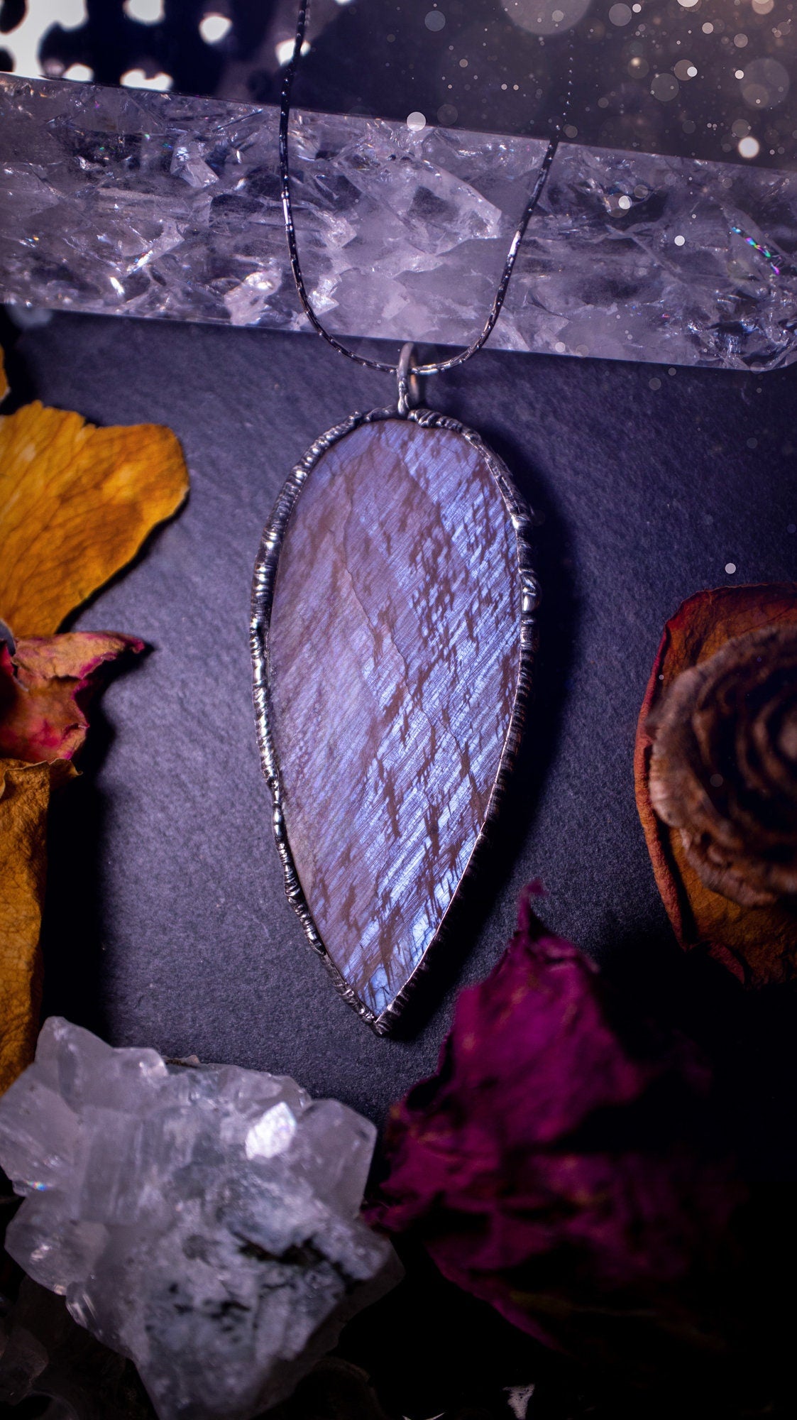 One of a kind, belomorite soft soldered pendant necklace. This pendant has been made using the tiffany technique and is made with lead free solder. The bezel is then polished to a high shine. Ideal gifts for goths, hippies and crystal lovers. Flashy.