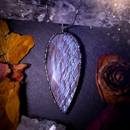 One of a kind, belomorite soft soldered pendant necklace. This pendant has been made using the tiffany technique and is made with lead free solder. The bezel is then polished to a high shine. Ideal gifts for goths, hippies and crystal lovers. Flashy.