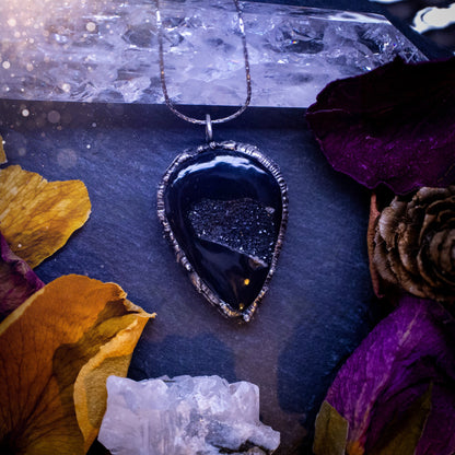 Beautiful black druzy onyx, soft soldered pendant necklace. This pendant has been made using the tiffany technique with lead free solder that contains silver. Featuring the most beautiful sparkly crystal. Gothic Jewellery. Crystals, witchy, gifts.