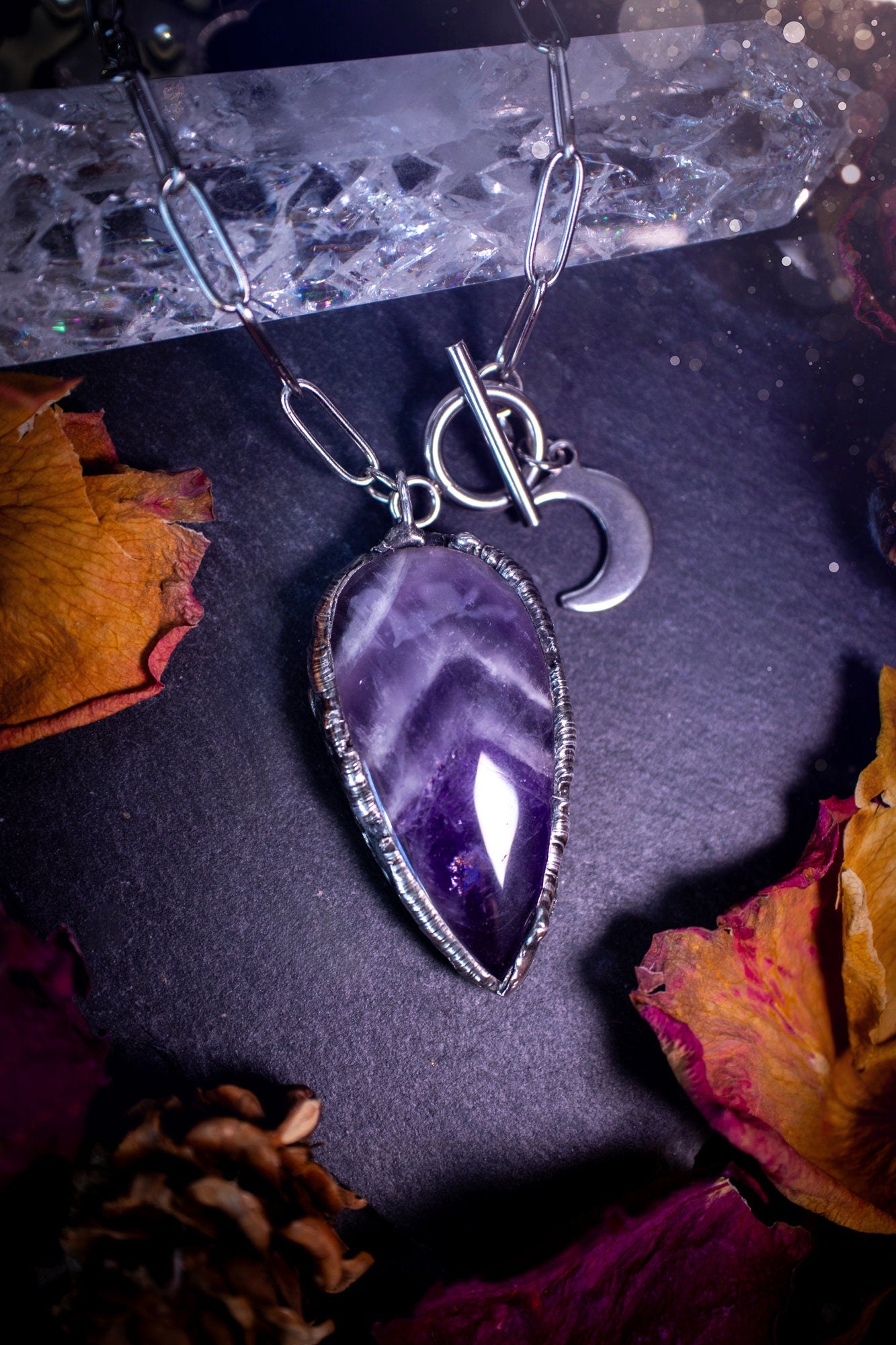 Beautiful, rich purple amethyst, soft soldered pendant necklace. This pendant has been made using the tiffany technique with lead free solder that contains silver. Featuring the most beautiful rainbow crystal. Gothic Jewellery. Crystals, witchy