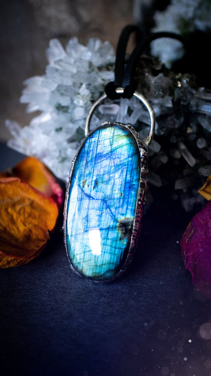 Beautiful, flashy blue labradorite crystal which has been soft soldered to create a stunning pendant. Natural crystal gemstone with lead free solder, a beautiful gift for any crystal lover. This piece of jewellery can be used for healing purposes.