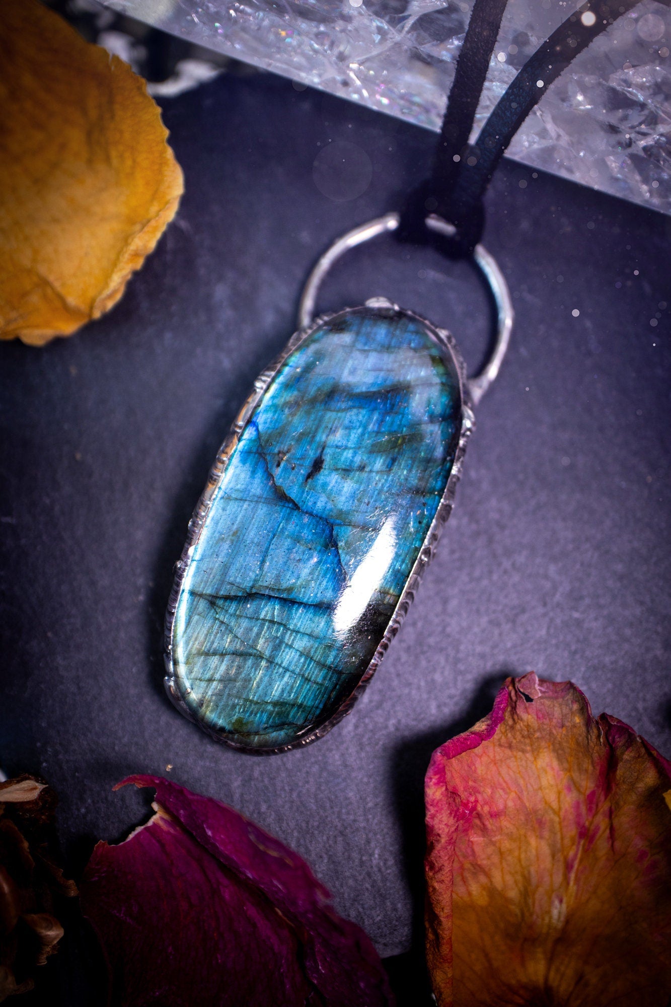 Beautiful, flashy blue labradorite crystal which has been soft soldered to create a stunning pendant. Natural crystal gemstone with lead free solder, a beautiful gift for any crystal lover. This piece of jewellery can be used for healing purposes.