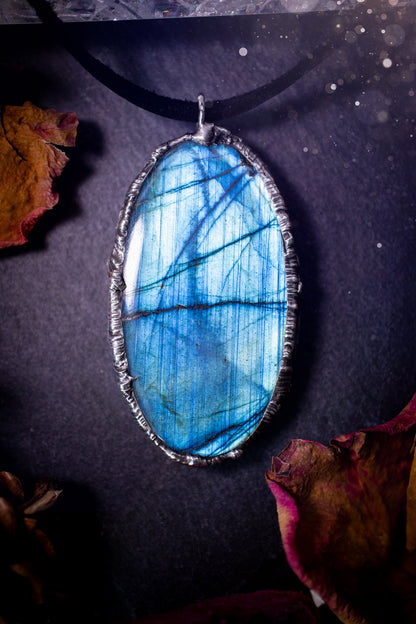 Beautiful, flashy blue labradorite crystal which has been soft soldered to create a stunning pendant. Natural crystal gemstone with lead free solder, a beautiful gift for any crystal lover. This piece of jewellery can be used for healing purposes.