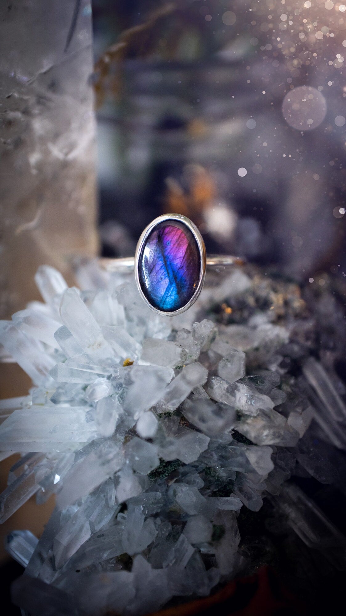 Beautiful and minimalistic, purple pink and blue labradorite crystal stacking ring. This ring has been made by hand, and is crafted from recycled sterling silver. Featuring the most bold, purple labradorite spectrolite crystal. Gifts for her, hippy