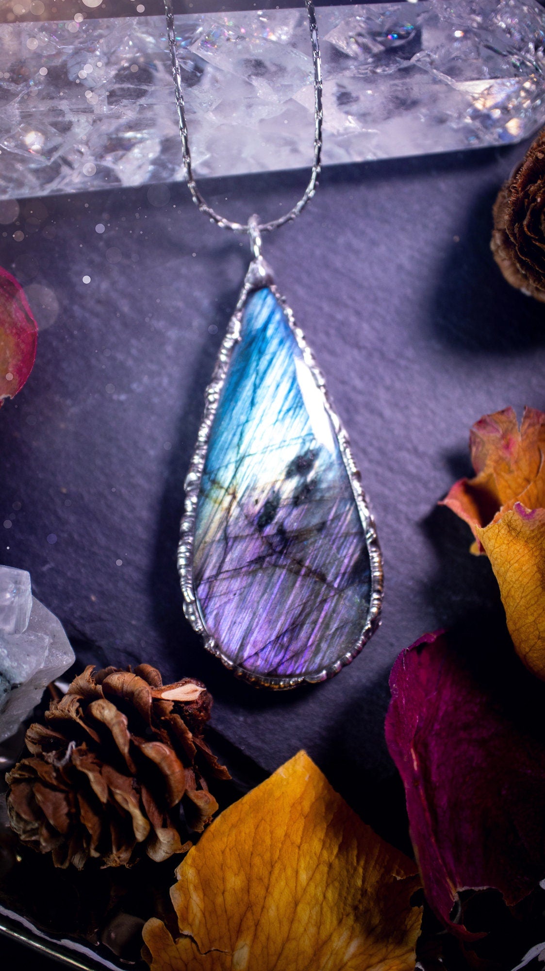 Beautiful, blue and purple labradorite crystal which has been soft soldered to create a stunning pendant. Natural crystal gemstone with lead free solder, a beautiful gift for any crystal lover. This piece of jewellery can be used for healing. Gothic