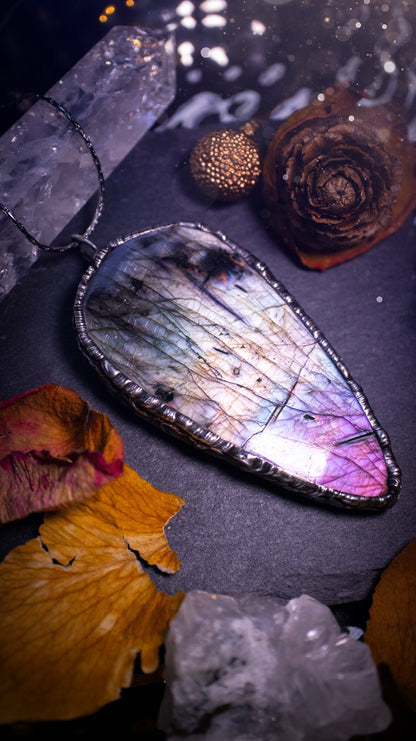 A very unique and stunning, handmade, silver with a pink tip, labradorite soft solder crystal pendant necklace. This pendant has been created using the tiffany technique and has a bezel made of solder which contains silver. Ideal gift for her and him