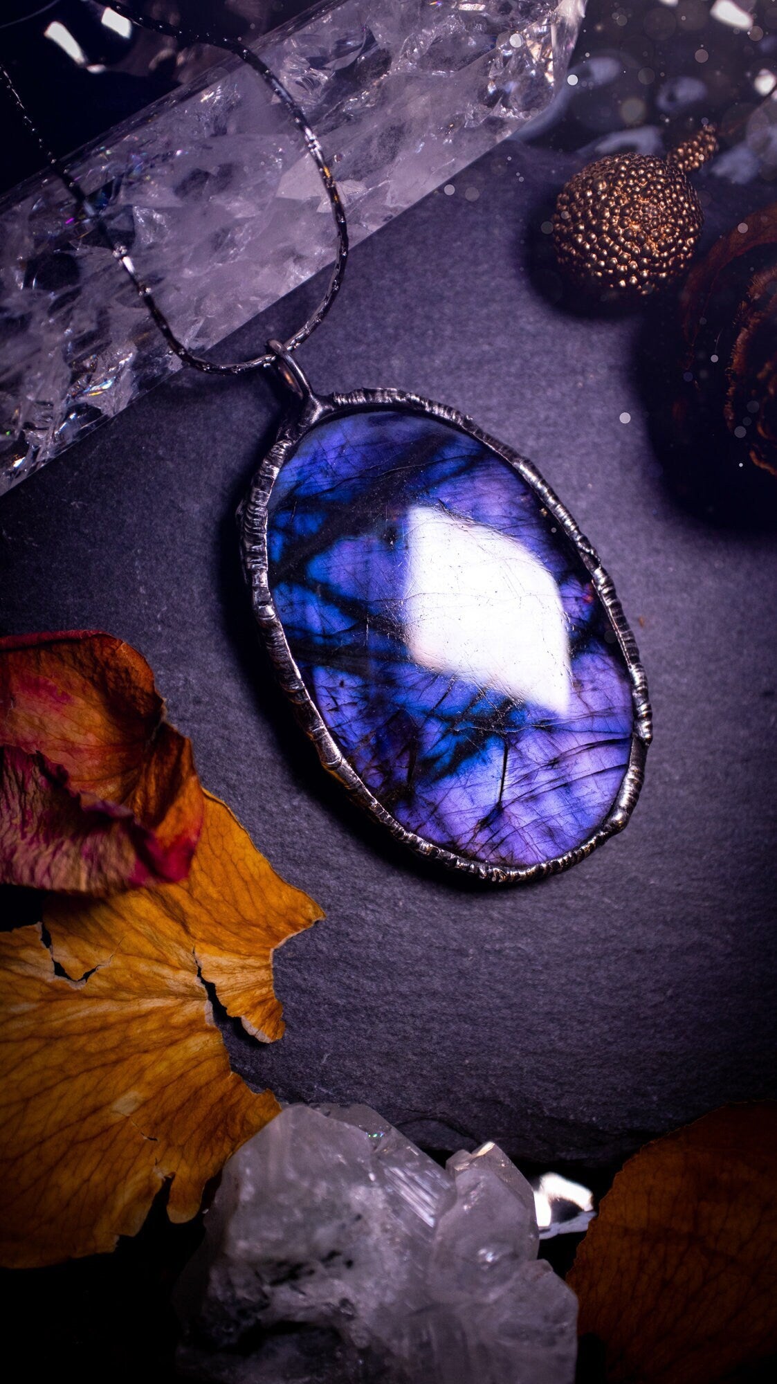 One of a kind, dark and mystical, deep purple flash, labradorite spectrolite crystal pendant necklace. Handmade using the soft solder technique, also known as the tiffany technique. Ideal gifts for both genders and crystal lovers. Witchy and gothic.