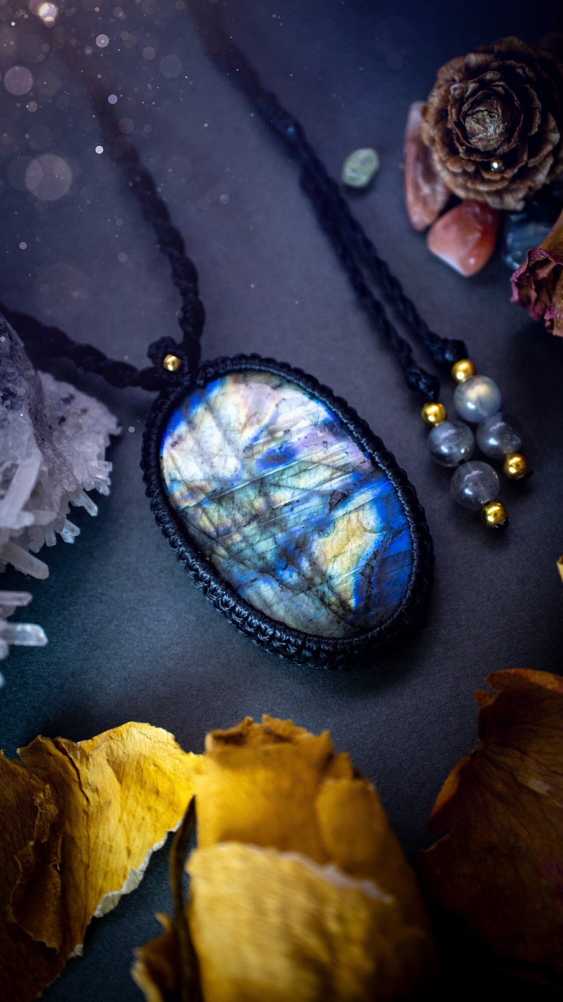 Handmade, blue and green labradorite macrame pendant necklace. Featuring a beautiful labradorite crystal which is full of icy colours and patterns. Crafted with high quality linhastia wax cord, and accents on the necklace. Hippy gifts his and hers.