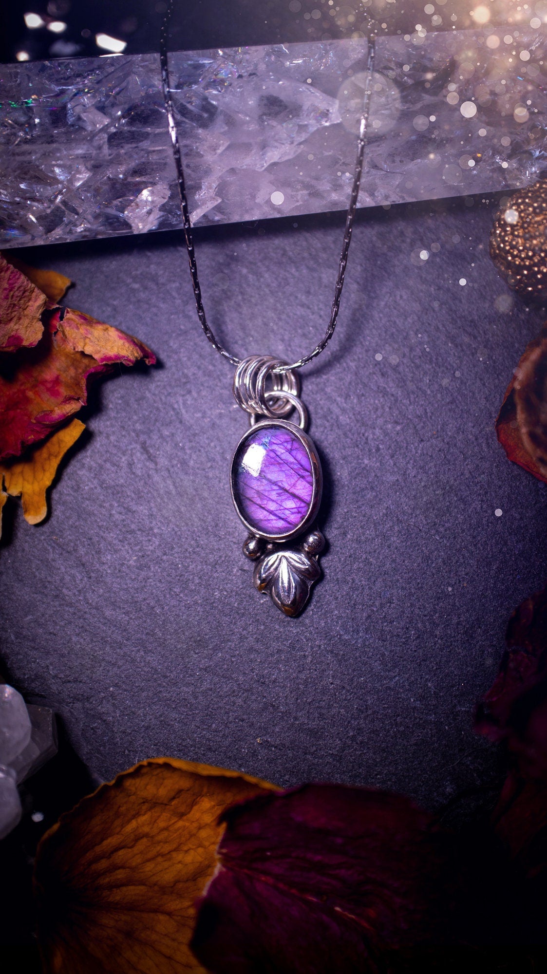 Gorgeous and dainty, sterling silver, deep purple flash, labradorite spectrolite pendant necklace. This beautiful necklace features a beautiful labradorite crystal full of colour. Handcrafted from sterling silver that has been recycled. Ideal gift.