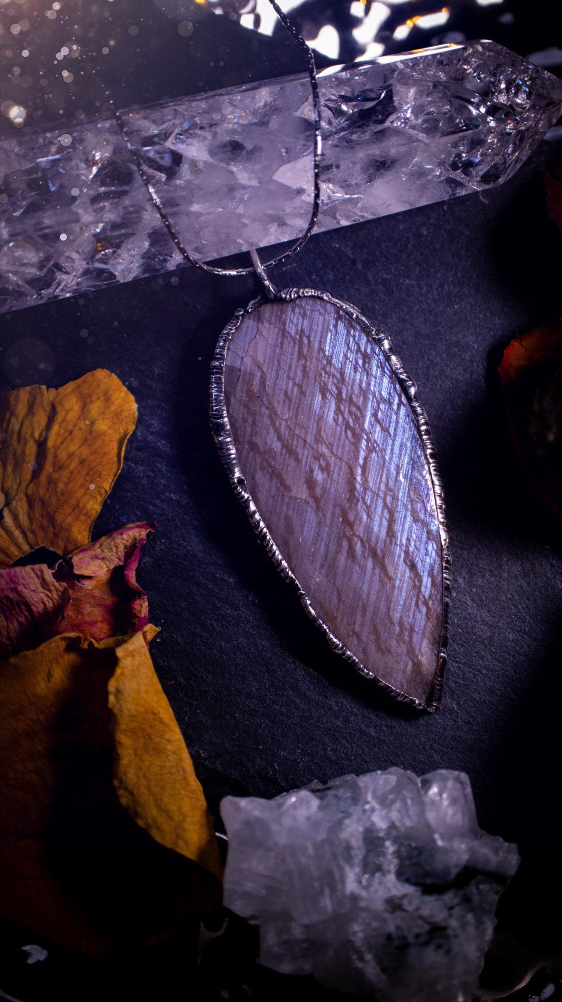 One of a kind, belomorite soft soldered pendant necklace. This pendant has been made using the tiffany technique and is made with lead free solder. The bezel is then polished to a high shine. Ideal gifts for goths, hippies and crystal lovers. Flashy.