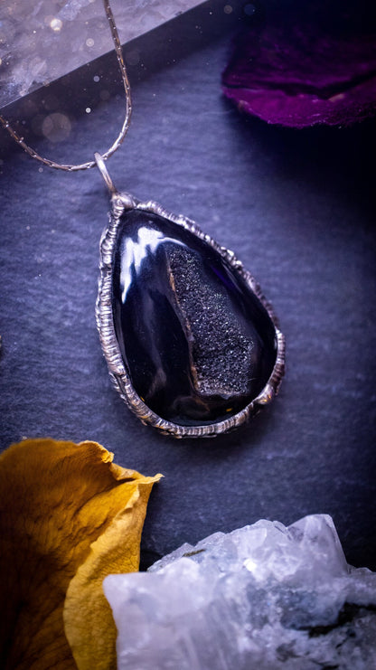 Beautiful black druzy onyx, soft soldered pendant necklace. This pendant has been made using the tiffany technique with lead free solder that contains silver. Featuring the most beautiful sparkly crystal. Gothic Jewellery. Crystals, witchy, gifts.