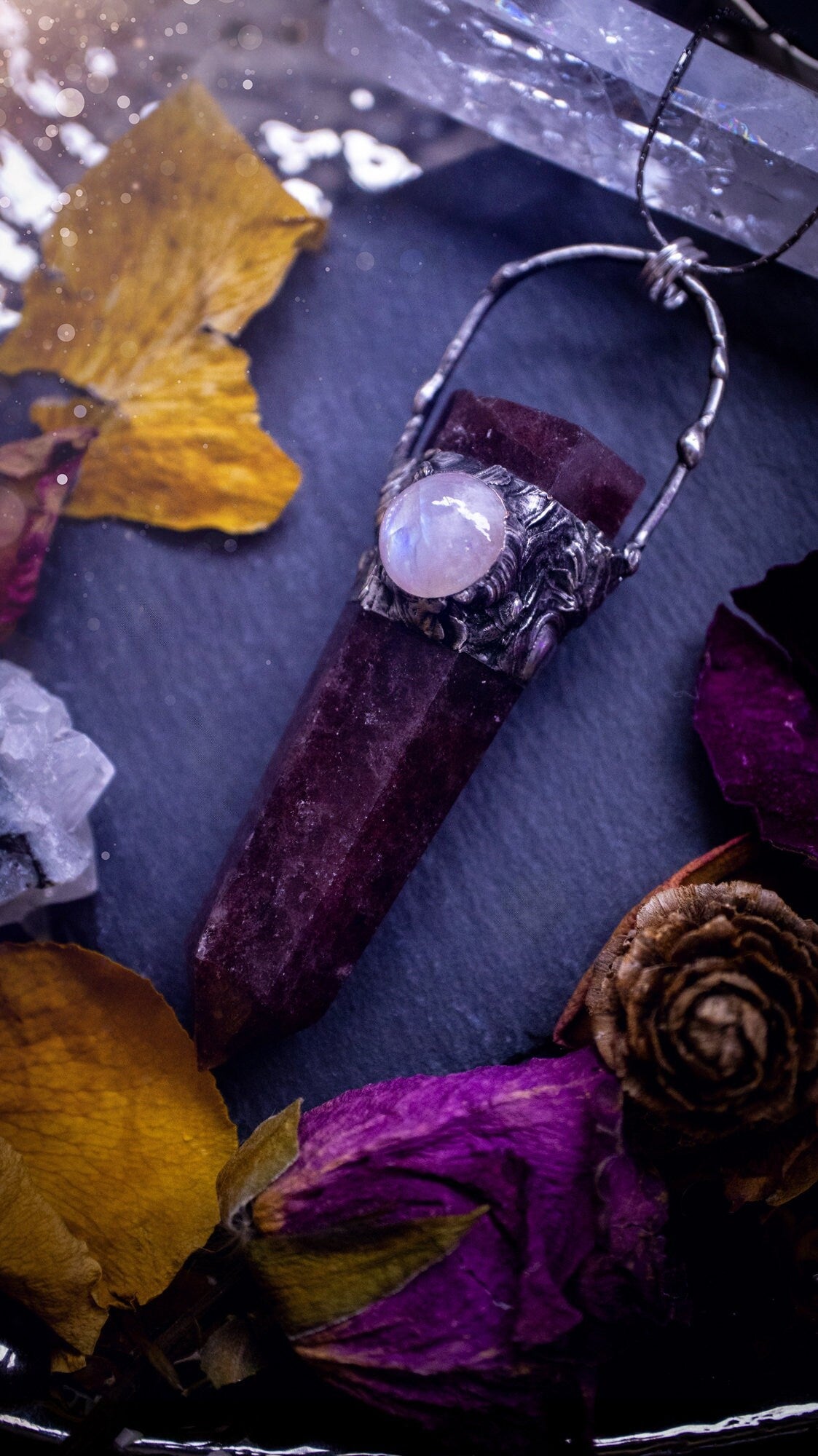 Beautiful strawberry quartz and rainbow moonstone talisman pendant necklace. This necklace has been created out of solder using the tiffany technique. Featuring a large strawberry quartz and a flashy moonstone. Gifts for witches, goths.