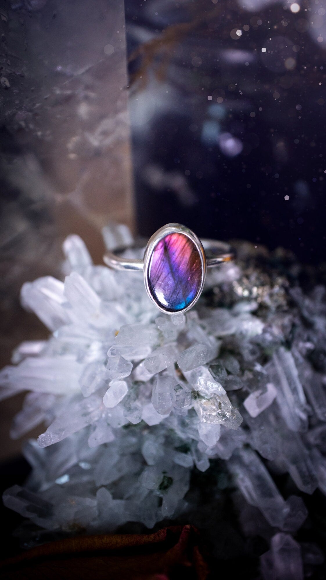 Beautiful and minimalistic, purple pink and blue labradorite crystal stacking ring. This ring has been made by hand, and is crafted from recycled sterling silver. Featuring the most bold, purple labradorite spectrolite crystal. Gifts for her, hippy