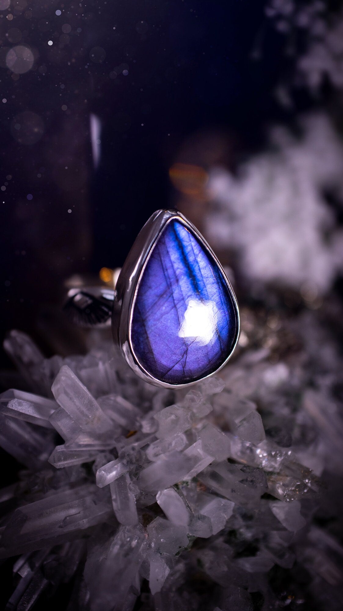 Stunning and handcrafted, natural purple labradorite sterling silver stacking ring. This beautiful ring has been made from recycled sterling silver and has a stamped ring shank. Size S. Ideal for crystal and jewellery lovers. Hippy and witch jewelry