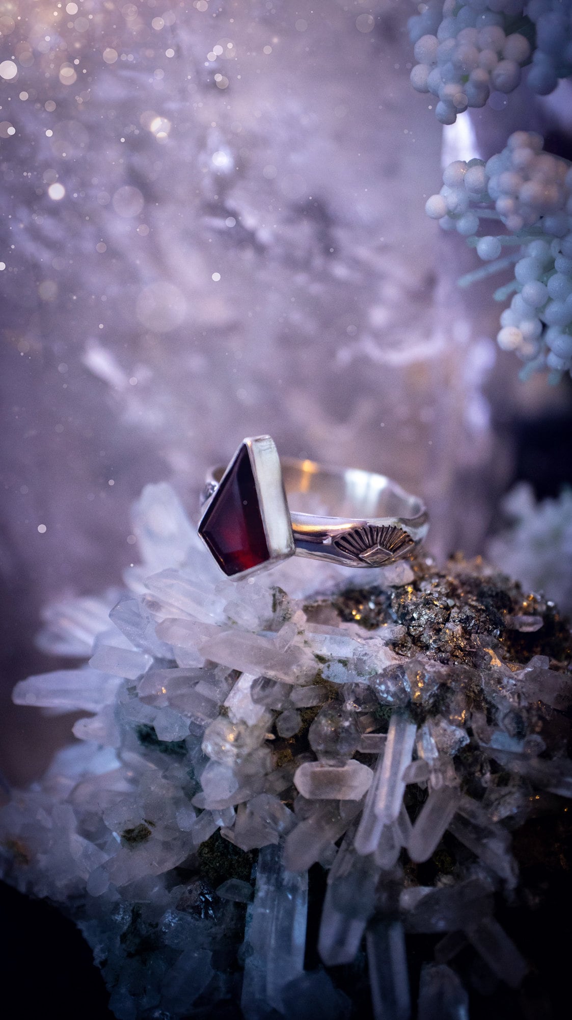 Beautiful and bold, garnet statement ring. Although this ring is dainty, it will certainly make a statement. Featuring a lovely red garnet crystal which is step cut, and mounted in sterling silver on a stamped ring band. Ideal crystal gifts for her