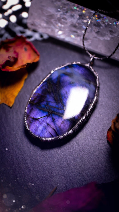 One of a kind, dark and mystical, deep purple flash, labradorite spectrolite crystal pendant necklace. Handmade using the soft solder technique, also known as the tiffany technique. Ideal gifts for both genders and crystal lovers. Witchy and gothic.