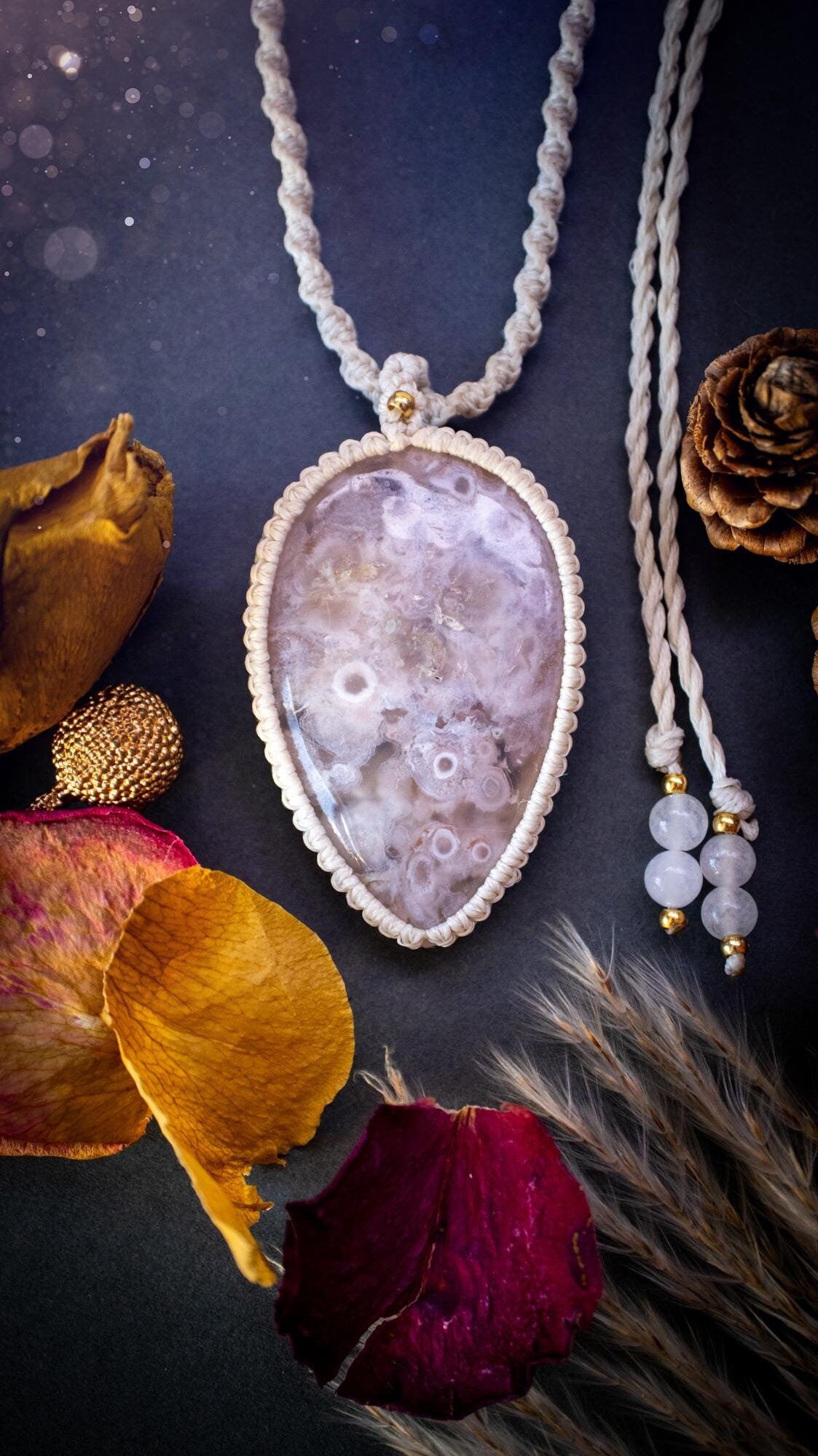 Stunning and large, flower agate macrame pendant necklace. This jewellery piece features a beautiful and large flower agate crystal gemstone. handmade using high quality linhastia waxed cord, completed with jade crystal beads and gold findings. Hippy