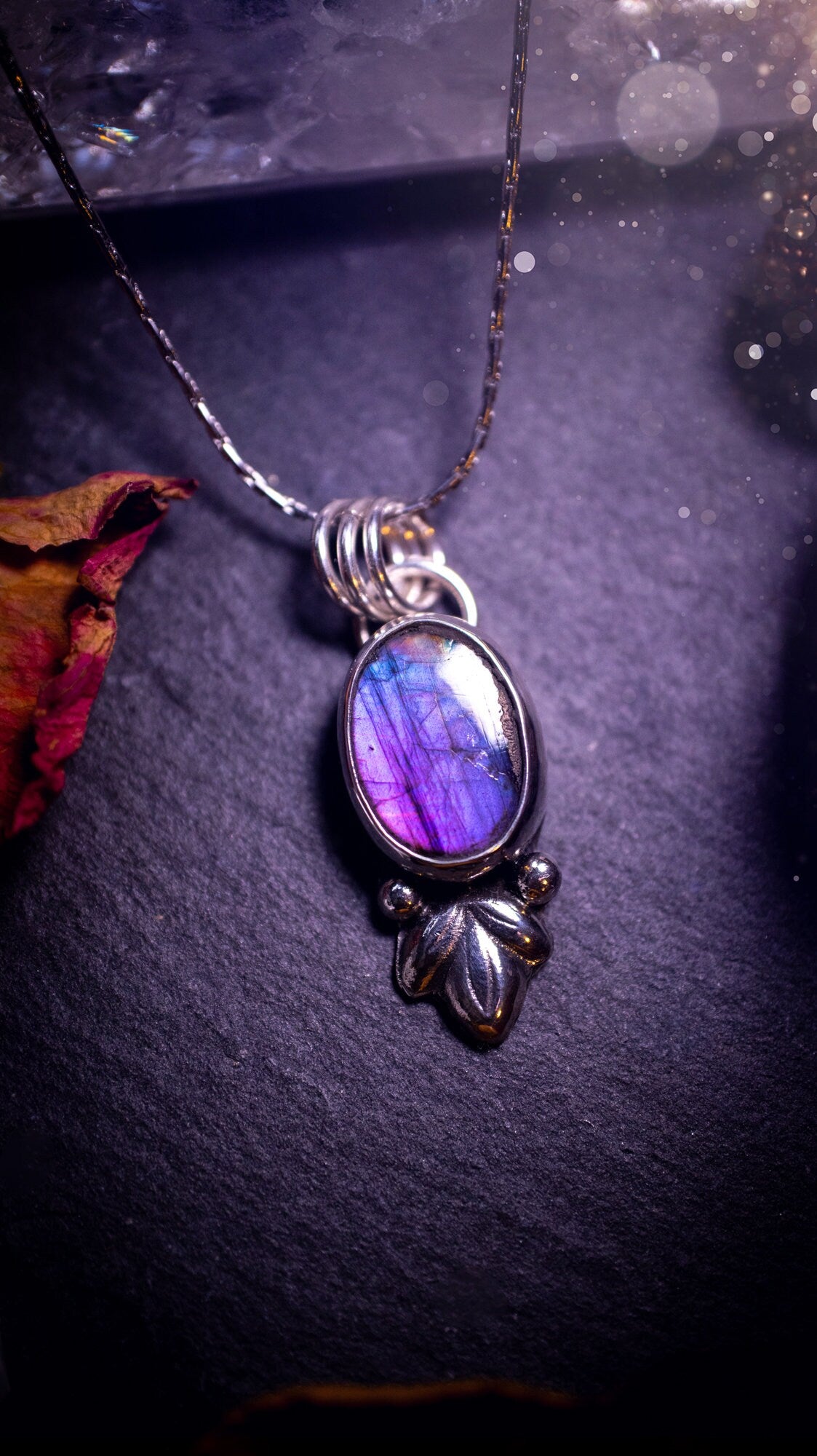 Gorgeous and dainty, sterling silver, deep purple flash, labradorite spectrolite pendant necklace. This beautiful necklace features a beautiful labradorite crystal full of colour. Handcrafted from sterling silver that has been recycled. Ideal gift.