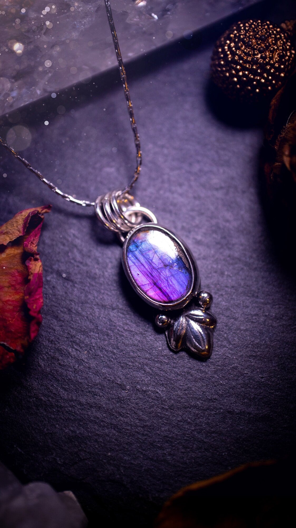 Gorgeous and dainty, sterling silver, deep purple flash, labradorite spectrolite pendant necklace. This beautiful necklace features a beautiful labradorite crystal full of colour. Handcrafted from sterling silver that has been recycled. Ideal gift.