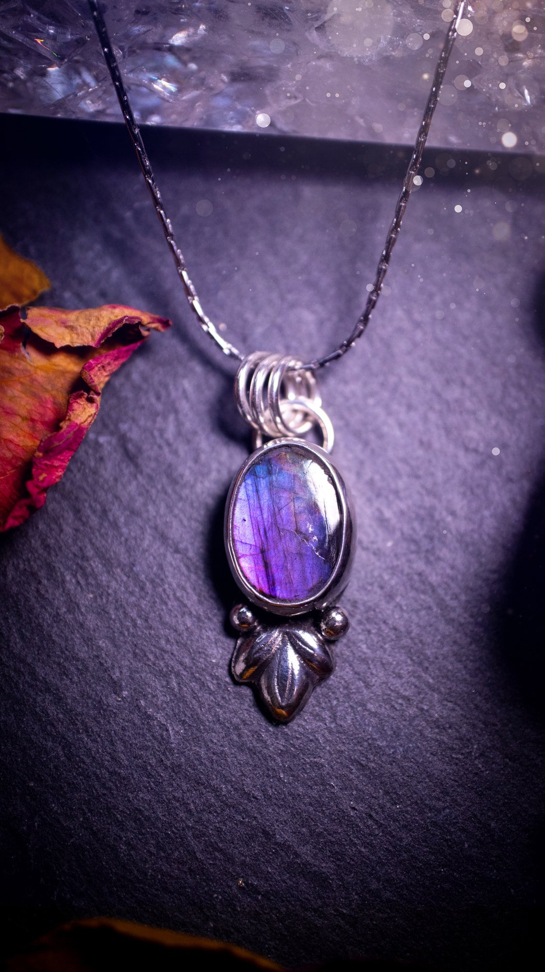 Gorgeous and dainty, sterling silver, deep purple flash, labradorite spectrolite pendant necklace. This beautiful necklace features a beautiful labradorite crystal full of colour. Handcrafted from sterling silver that has been recycled. Ideal gift.