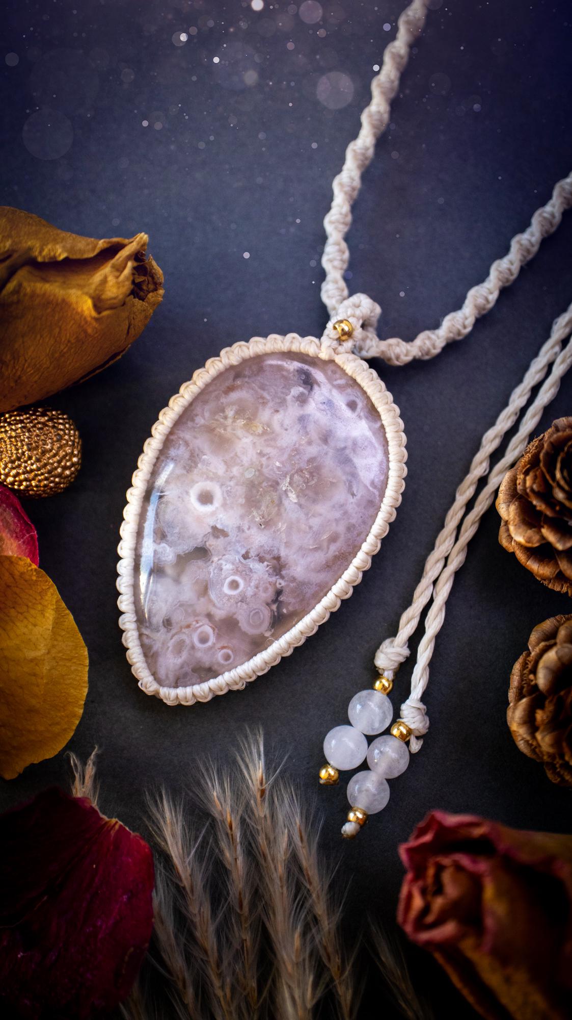 Stunning and large, flower agate macrame pendant necklace. This jewellery piece features a beautiful and large flower agate crystal gemstone. handmade using high quality linhastia waxed cord, completed with jade crystal beads and gold findings. Hippy