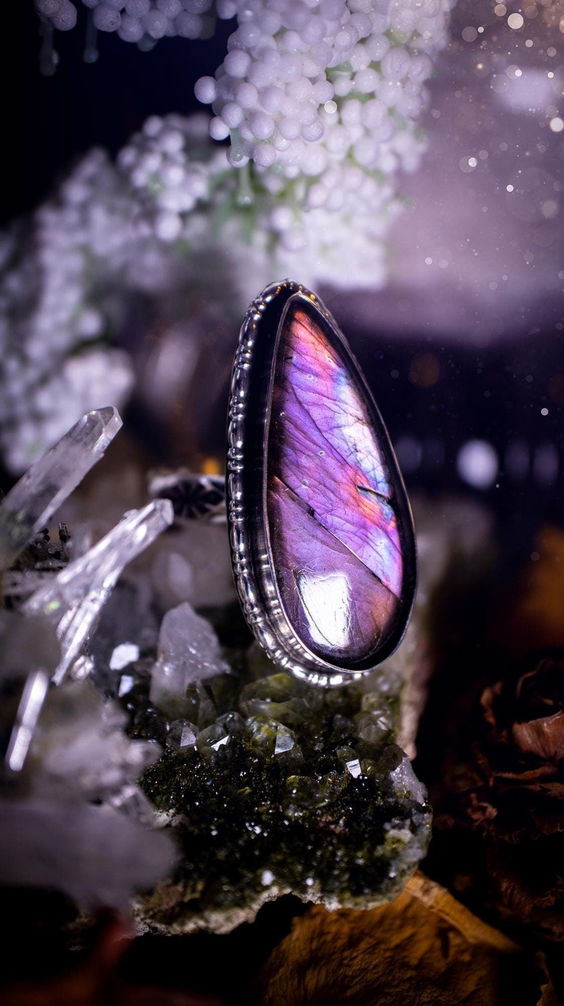 Beautiful deep purple and pink, Labradorite crystal, sterling silver pendant ring. This ring will be finished in your requested size. Featuring a large purple labradorite crystal that is very flashy. Very unique and one of a kind. Jewellery gifts