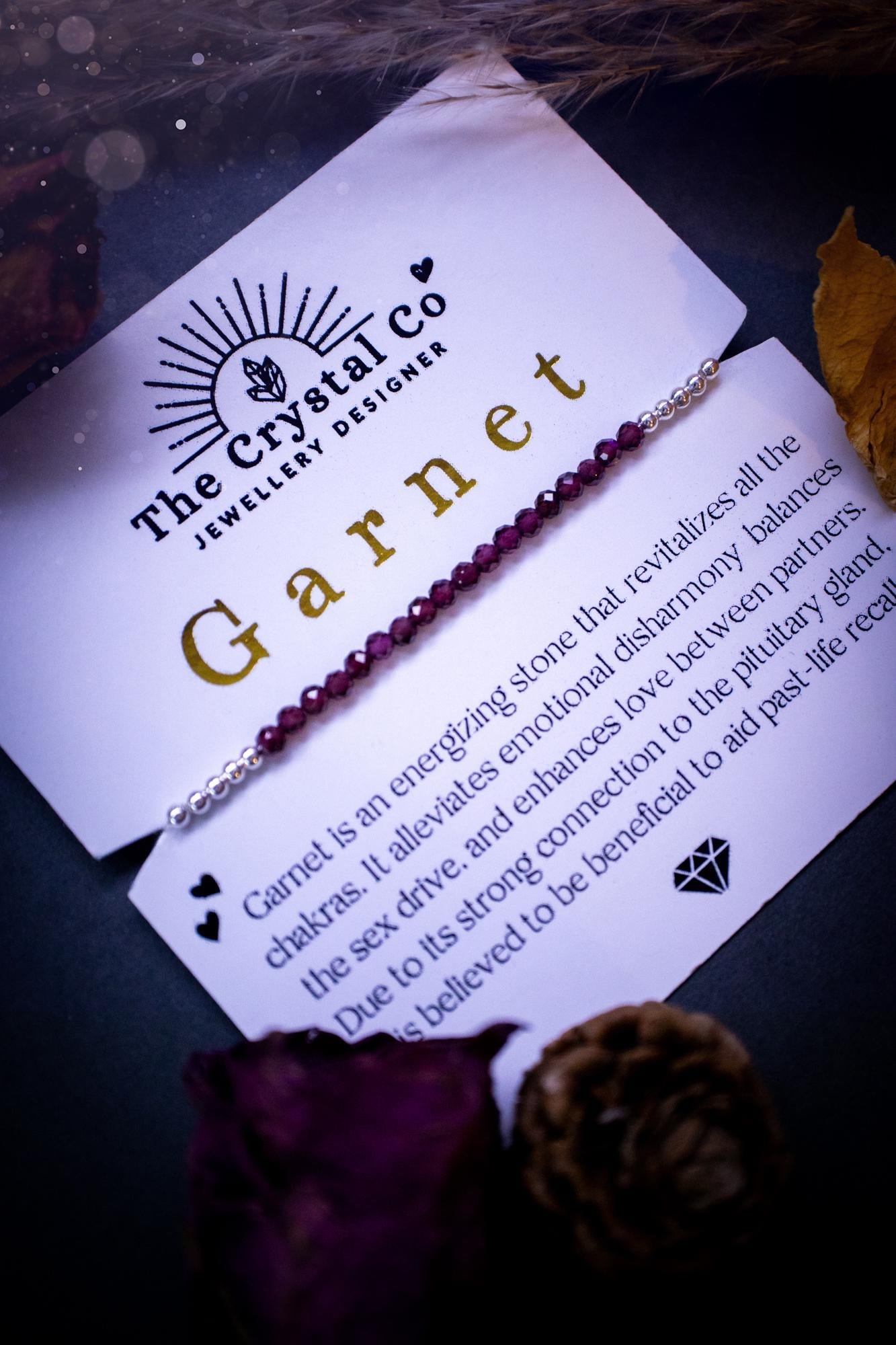 Beautiful and handmade, little crystal garnet stacking bracelet. Featuring faceted natural garnet crystal beads, strung onto elastic with silver plated bead. Garnet is the birthstone for January. Complete with properties card. Ideal crystal gifts.