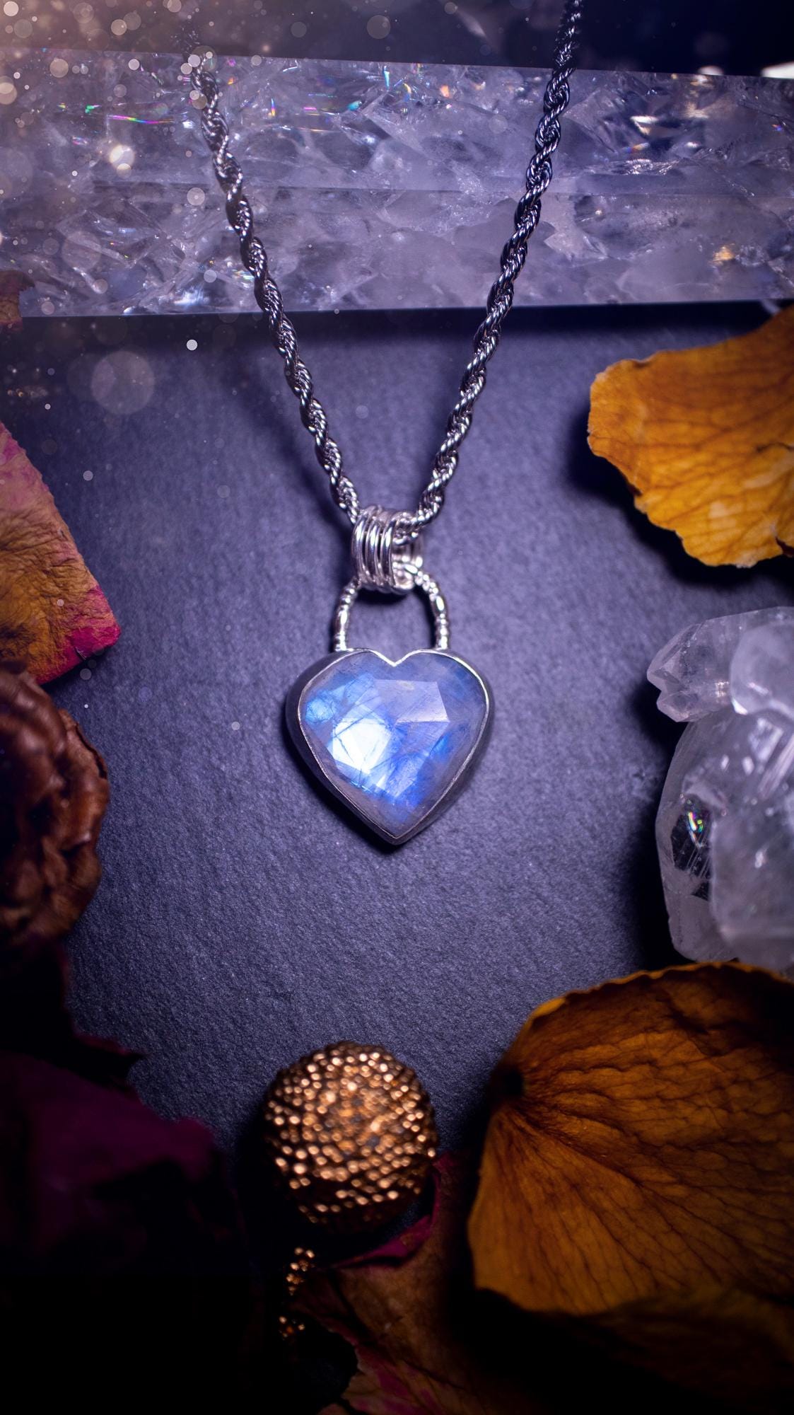 Beautifully handmade, rose cut, rainbow moonstone pendant necklace. This beautiful rainbow moonstone crystal is heart shaped and has a gorgeous flash and sparkle. Made from sterling silver and super dainty. Ideal gift for crystal lovers. Hippy gifts