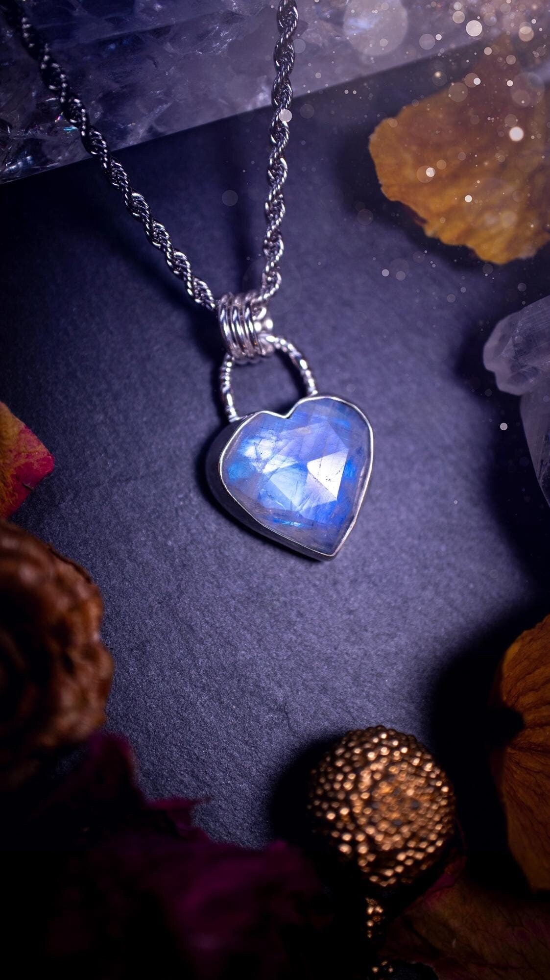 Beautifully handmade, rose cut, rainbow moonstone pendant necklace. This beautiful rainbow moonstone crystal is heart shaped and has a gorgeous flash and sparkle. Made from sterling silver and super dainty. Ideal gift for crystal lovers. Hippy gifts