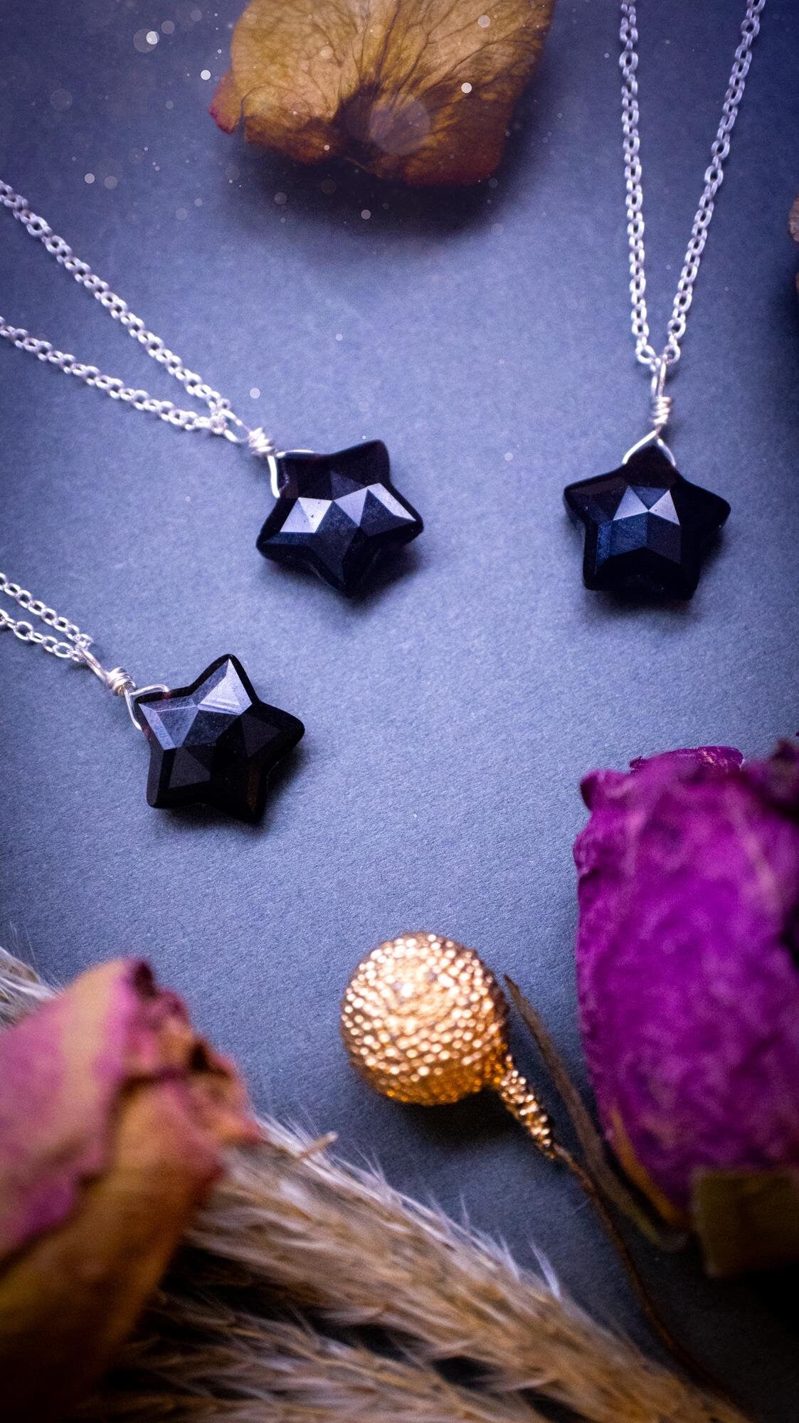 Beautiful and natural, handmade crystal obsidian star pendant necklace. This dainty little necklace features a gorgeous crystal obsidian star that comes on a sterling silver cable chain. Ideal for little gifts to friends and family, or crystal lovers