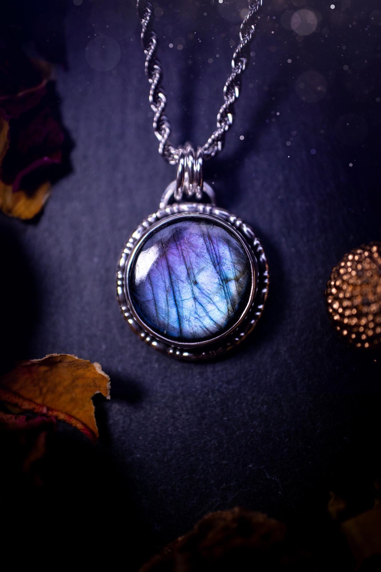 Beautifully handcrafted, dainty purple and blue Labradorite spectrolite pendant necklace. This circular labradorite is full of stunning colour and patterns which has been made into a pendant using recycled sterling silver. Crystal gifts, gothic.