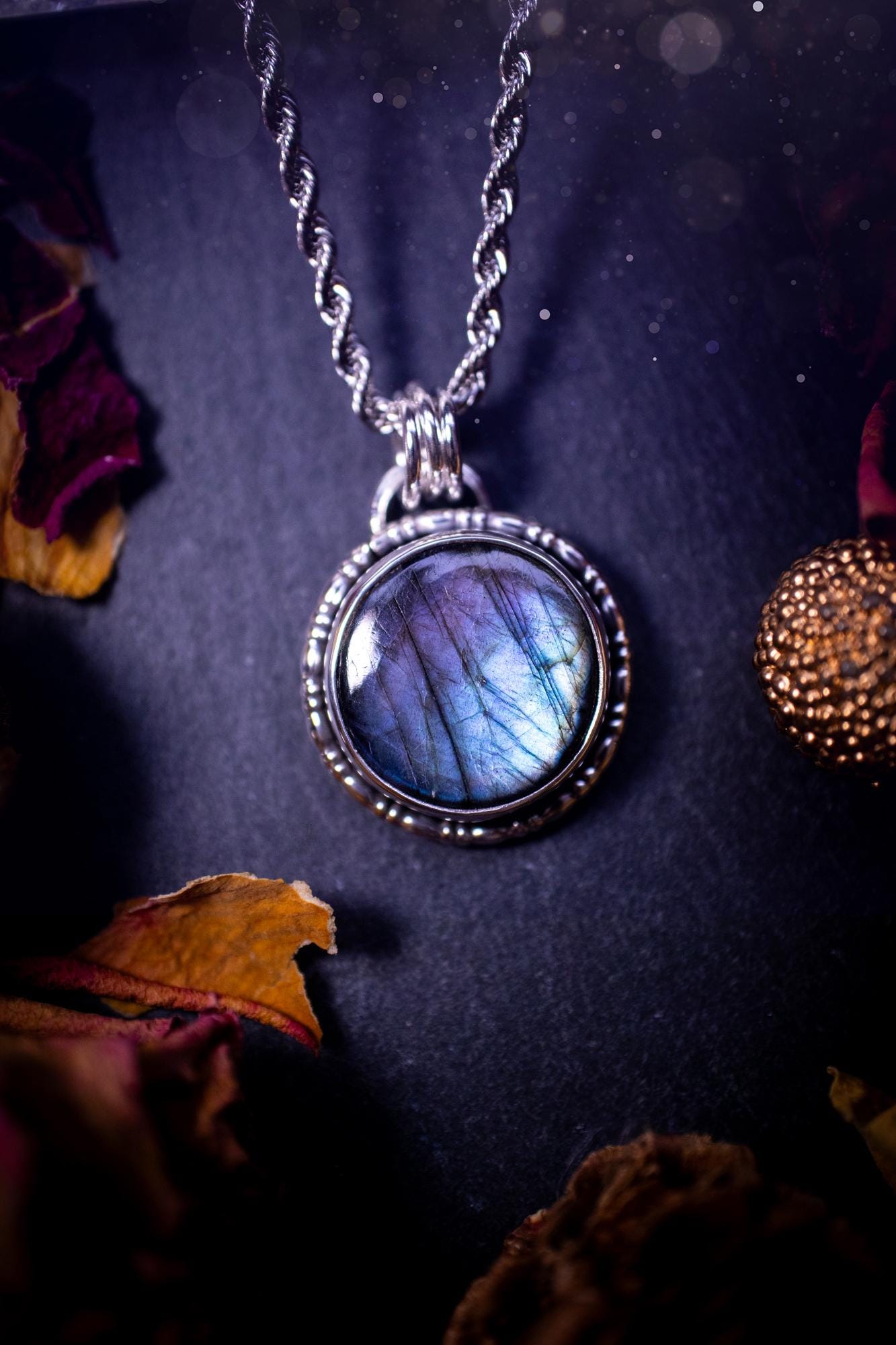 Beautifully handcrafted, dainty purple and blue Labradorite spectrolite pendant necklace. This circular labradorite is full of stunning colour and patterns which has been made into a pendant using recycled sterling silver. Crystal gifts, gothic.