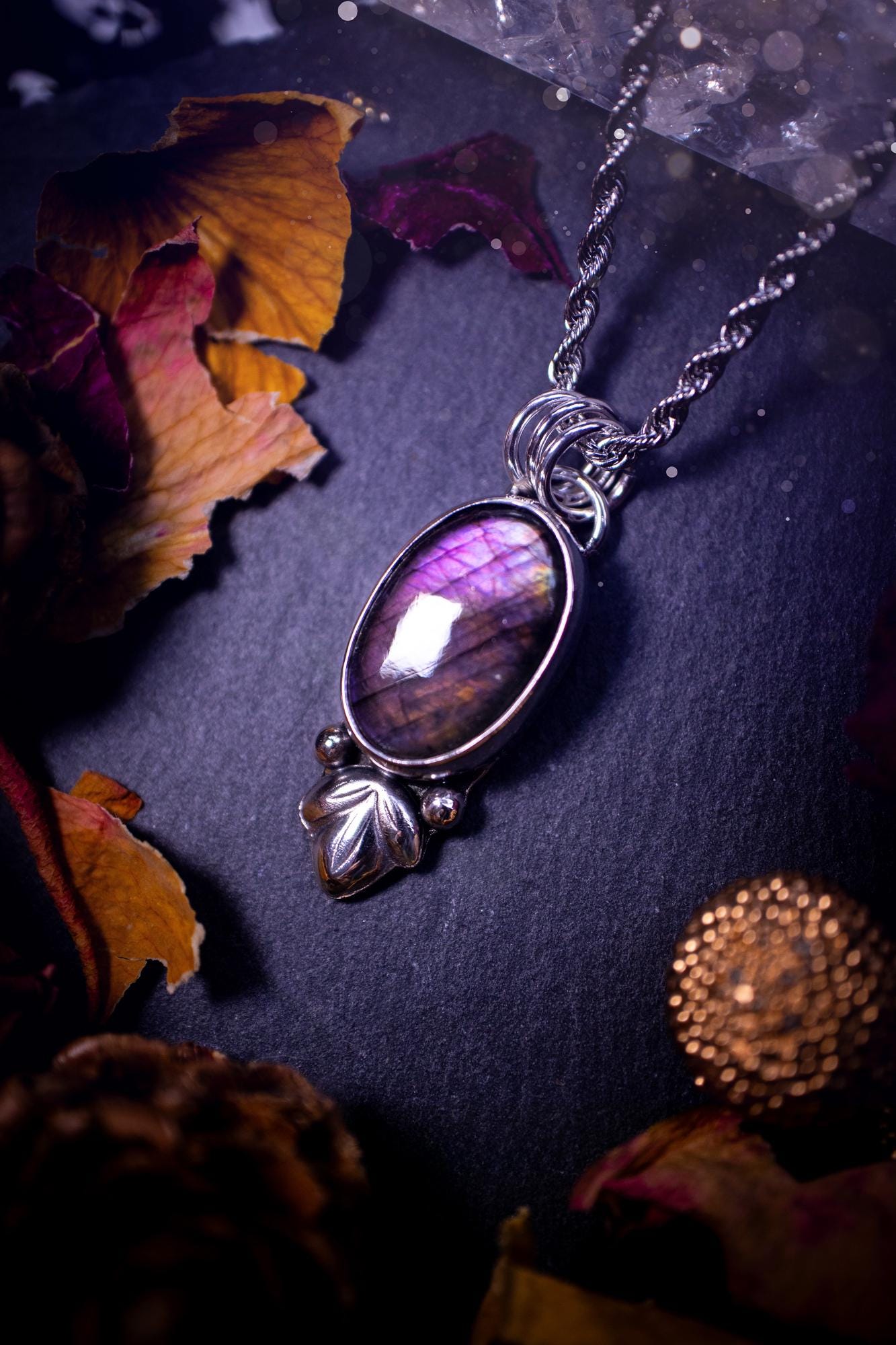 Gorgeous and dainty, sterling silver, deep purple flash, labradorite spectrolite pendant necklace. This beautiful necklace features a beautiful labradorite crystal full of colour. Handcrafted from sterling silver that has been recycled. Ideal gift.