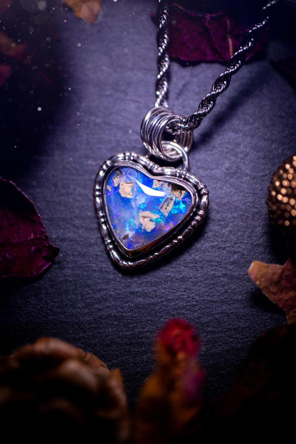 Handmade and stunning, Australian pipe opal, sterling silver, heart pendant necklace. Featuring a super flashy opal with hues of blue, green and purple. Made from recycled sterling silver with fancy gallery wire. Ideal gift for opal lovers. Bohemian