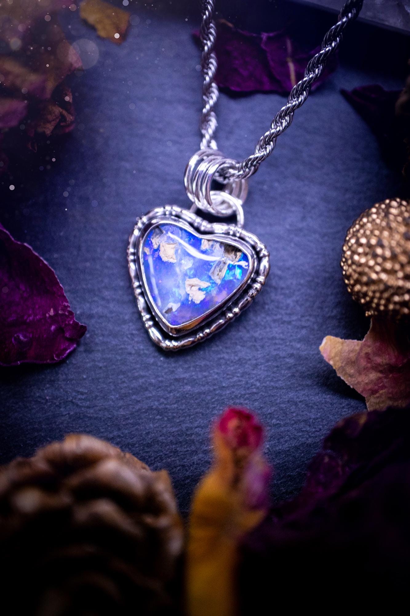 Handmade and stunning, Australian pipe opal, sterling silver, heart pendant necklace. Featuring a super flashy opal with hues of blue, green and purple. Made from recycled sterling silver with fancy gallery wire. Ideal gift for opal lovers. Bohemian