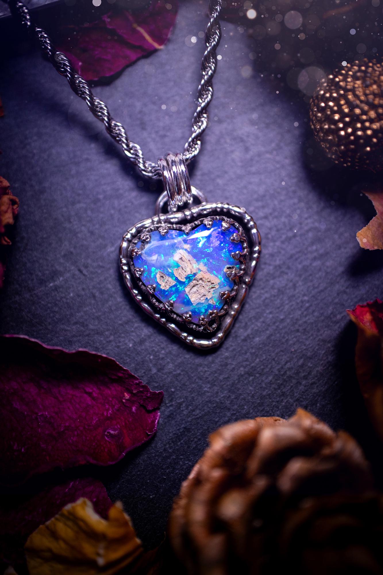 Handmade and stunning, Australian pipe opal, sterling silver, heart pendant necklace. Featuring a super flashy opal with hues of blue, green and purple. Made from recycled sterling silver with fancy gallery wire. Ideal gift for opal lovers. Bohemian