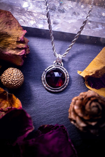 Handcrafted, one of a kind, sterling silver, garnet crystal pendant necklace. This necklace has been made using a beautiful rose cut garnet gemstone, with a minimal dainty design using recycled sterling silver. Ideal gift for crystal lovers. Gothic