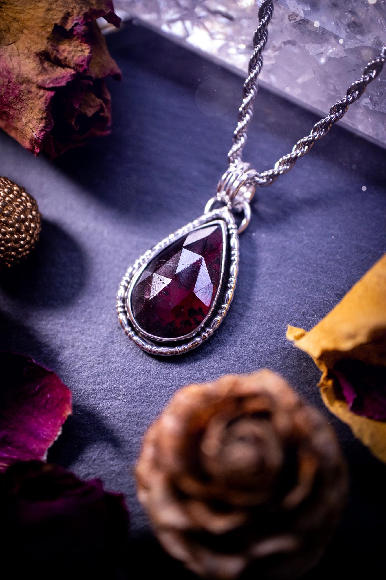 Handcrafted, one of a kind, sterling silver, garnet crystal pendant necklace. This necklace has been made using a beautiful rose cut garnet gemstone, with a minimal dainty design using recycled sterling silver. Ideal gift for crystal lovers. Gothic