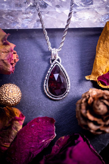 Handcrafted, one of a kind, sterling silver, garnet crystal pendant necklace. This necklace has been made using a beautiful rose cut garnet gemstone, with a minimal dainty design using recycled sterling silver. Ideal gift for crystal lovers. Gothic