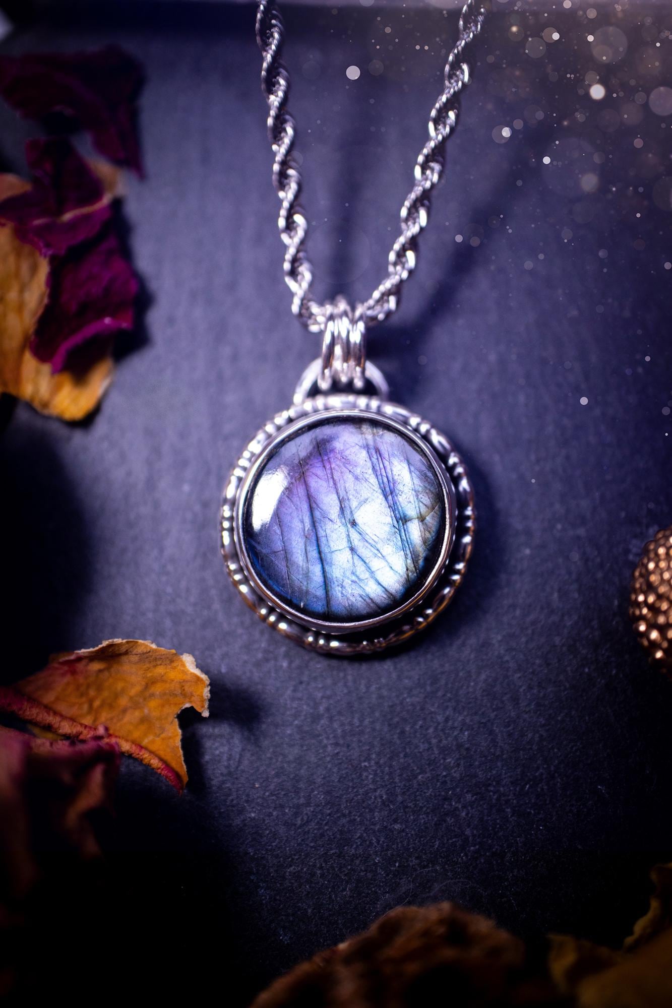 Beautifully handcrafted, dainty purple and blue Labradorite spectrolite pendant necklace. This circular labradorite is full of stunning colour and patterns which has been made into a pendant using recycled sterling silver. Crystal gifts, gothic.