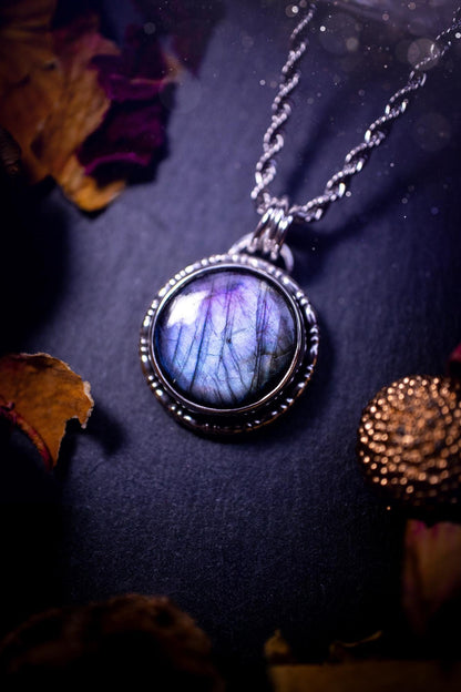 Beautifully handcrafted, dainty purple and blue Labradorite spectrolite pendant necklace. This circular labradorite is full of stunning colour and patterns which has been made into a pendant using recycled sterling silver. Crystal gifts, gothic.