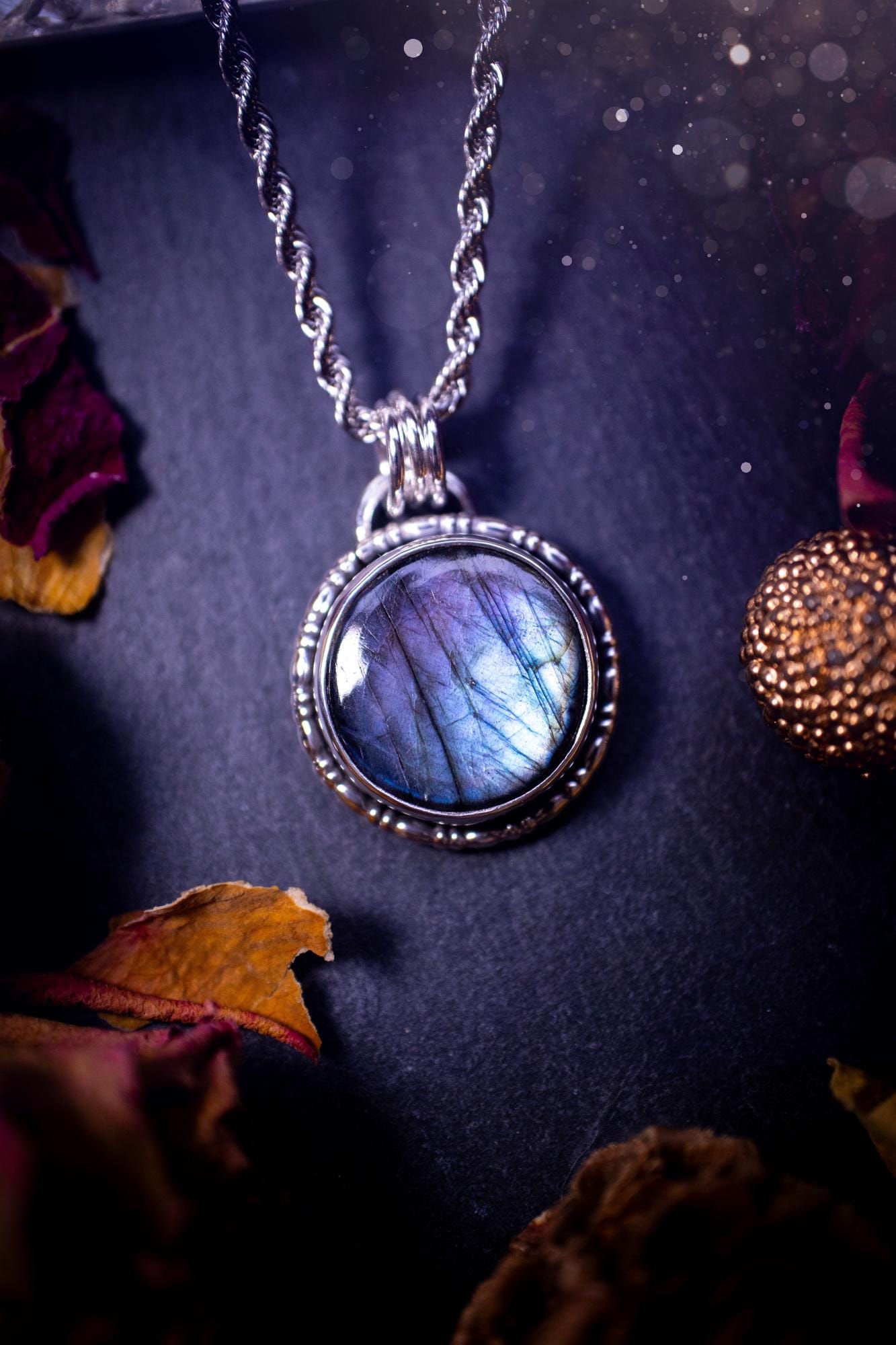 Beautifully handcrafted, dainty purple and blue Labradorite spectrolite pendant necklace. This circular labradorite is full of stunning colour and patterns which has been made into a pendant using recycled sterling silver. Crystal gifts, gothic.