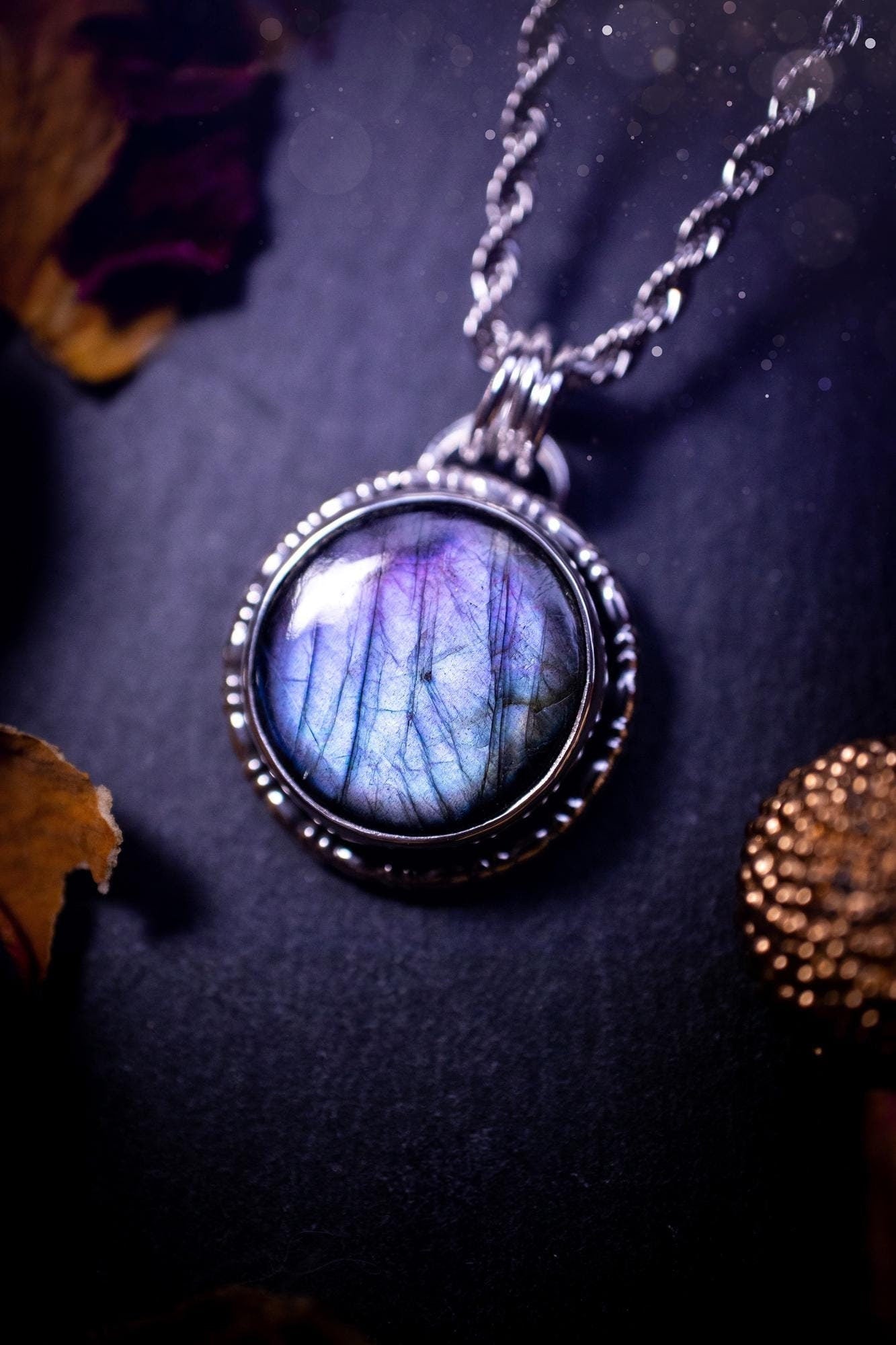 Beautifully handcrafted, dainty purple and blue Labradorite spectrolite pendant necklace. This circular labradorite is full of stunning colour and patterns which has been made into a pendant using recycled sterling silver. Crystal gifts, gothic.