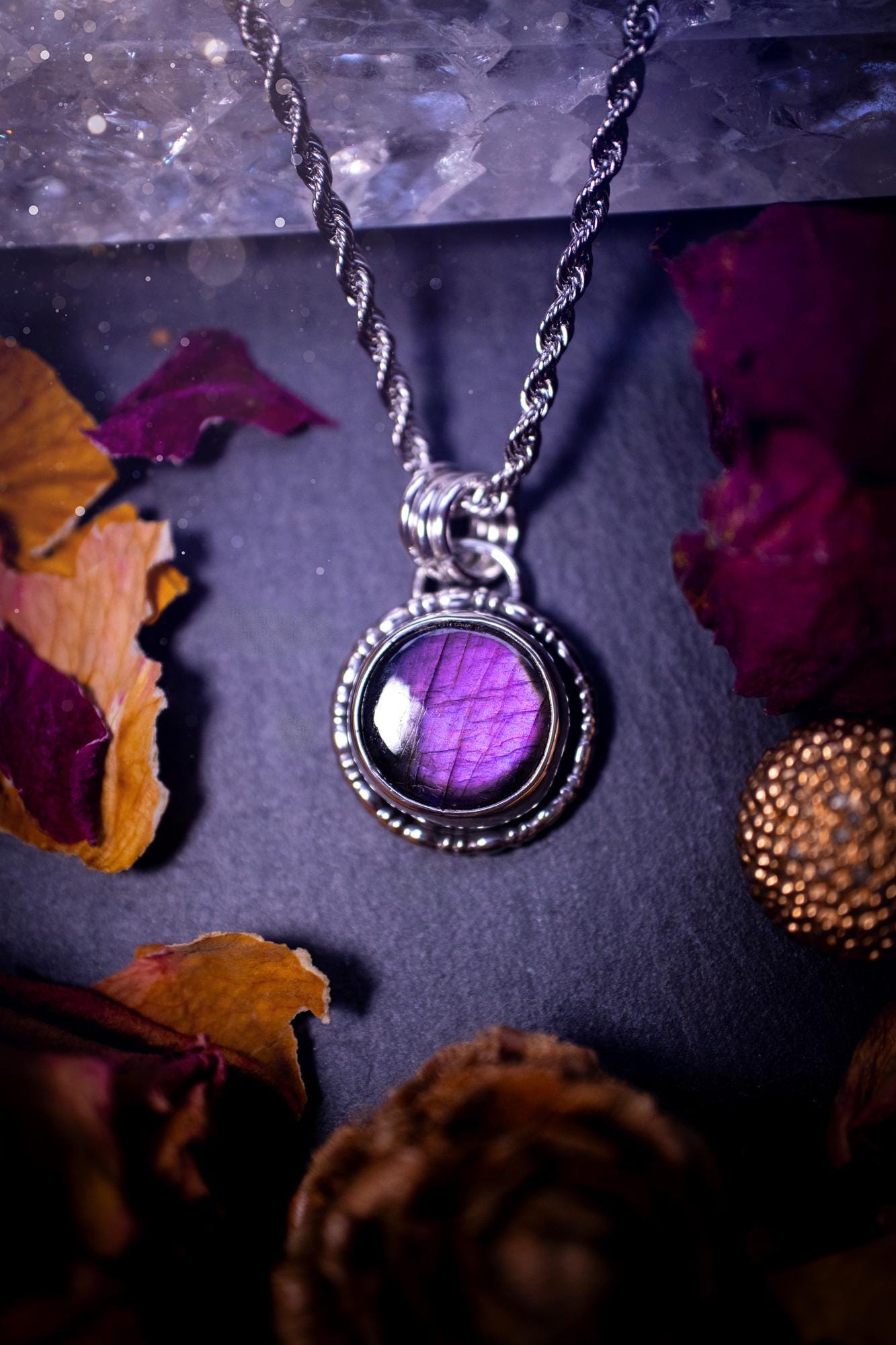 Beautifully handcrafted, dainty, deep purple  Labradorite spectrolite pendant necklace. This circular labradorite is full of stunning colour and patterns which has been made into a pendant using recycled sterling silver. Crystal gifts, gothic, hippy