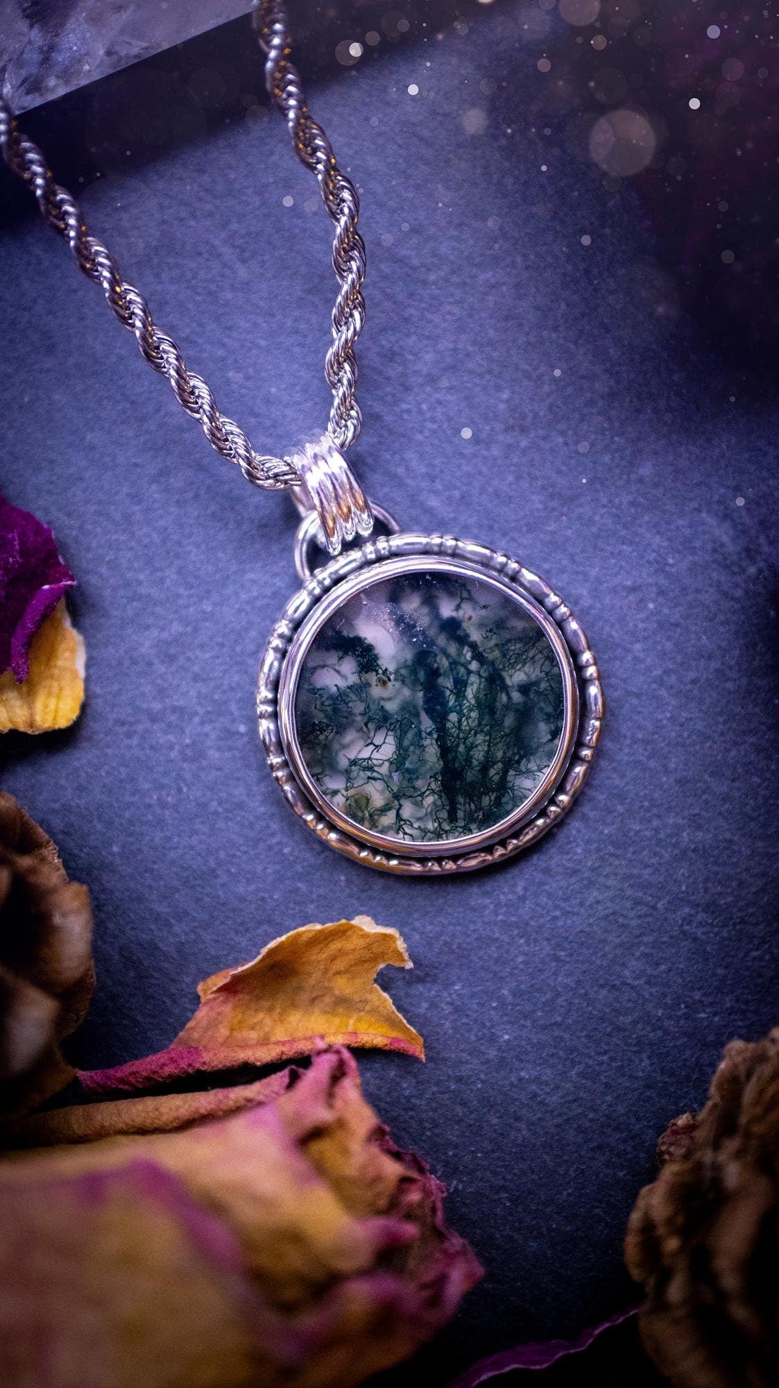 Beautifully handmade, dainty, moss agate crystal pendant necklace. This circular moss agate is full of stunning colour and patterns which has been made into a pendant using recycled sterling silver. Crystal gifts, gothic and hippy jewellery.