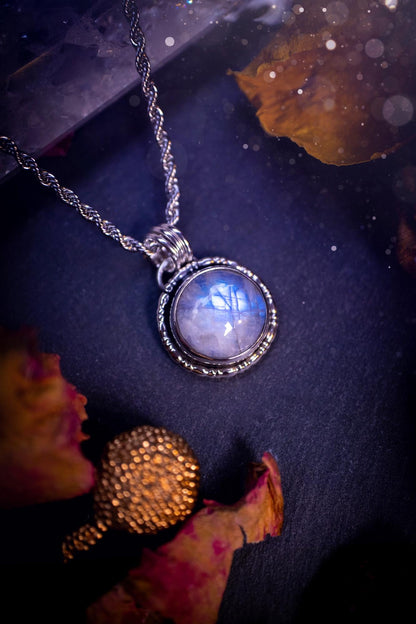 Handcrafted and unique, sterling silver, rainbow moonstone crystal pendant necklace. This necklace has been made using a beautiful flashy moonstone, with a minimal dainty design using recycled sterling silver. Ideal gift for crystal lovers. Gothic